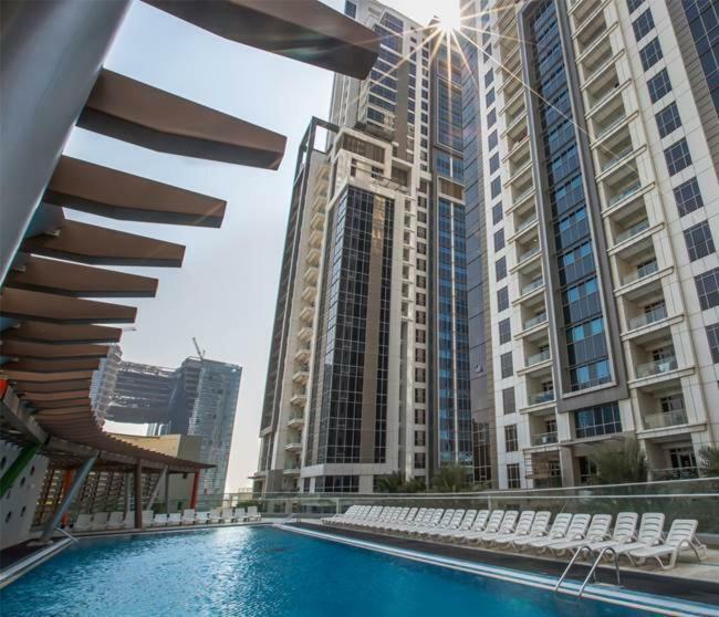 Higuests Vacation Homes - Executive Tower Dubai Esterno foto